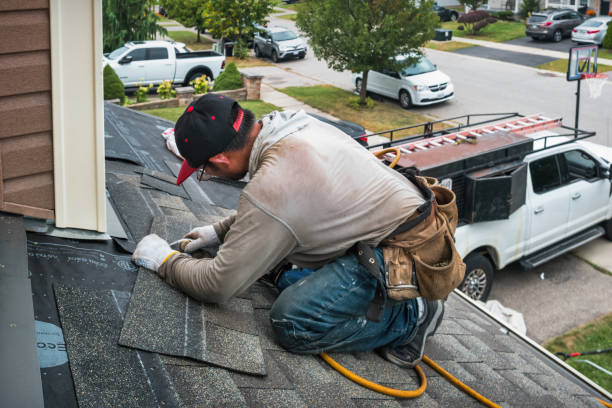 Professional Roofing technician working in Hamburg, PA
